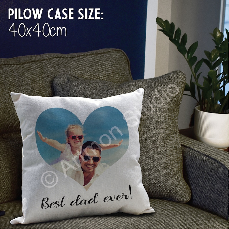 May include: White pillowcase with a heart-shaped photo of a father and daughter. The photo shows the father holding the daughter on his shoulders as she has her arms outstretched. The text "Best dad ever!" is printed below the photo. The pillowcase is 40x40cm.