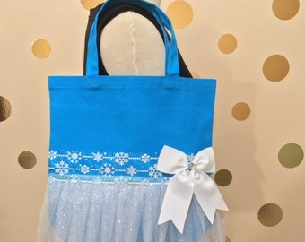 Motyw Disney Frozen - niebieski z błyszczącymi płatkami śniegu Elegancka torba typu tote z tutu - Przezroczysta niebieska wstążka