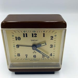 Vintage NOS Peter mechanical table alarm  clock in brown color