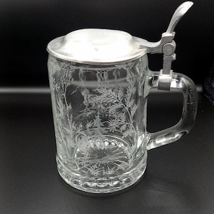 Beer glass with deer dog and floral decoration from West Germany