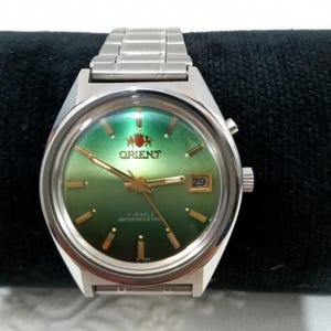 Orient NOS  mechanical wrist watch with date from Japan