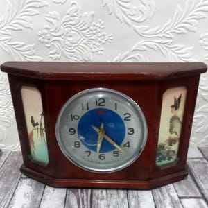 Vintage table clock NOS wooden mechanical  with jet plane second from China