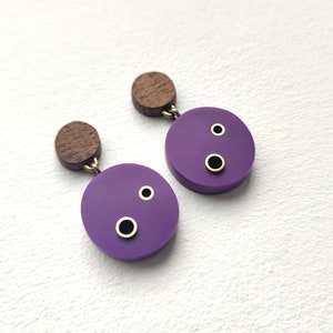 Circle dangle & drop earrings with acrylic and brass details.