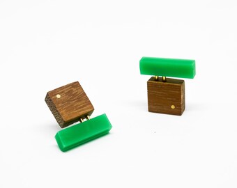 Wooden stud earrings with green acrylic and brass details