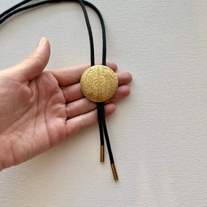 Floral Brass medallion bolo tie necklace