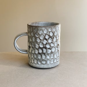 Hand carved rustic white ceramic mug cup in toasted clay, handmade stoneware ceramic Craters