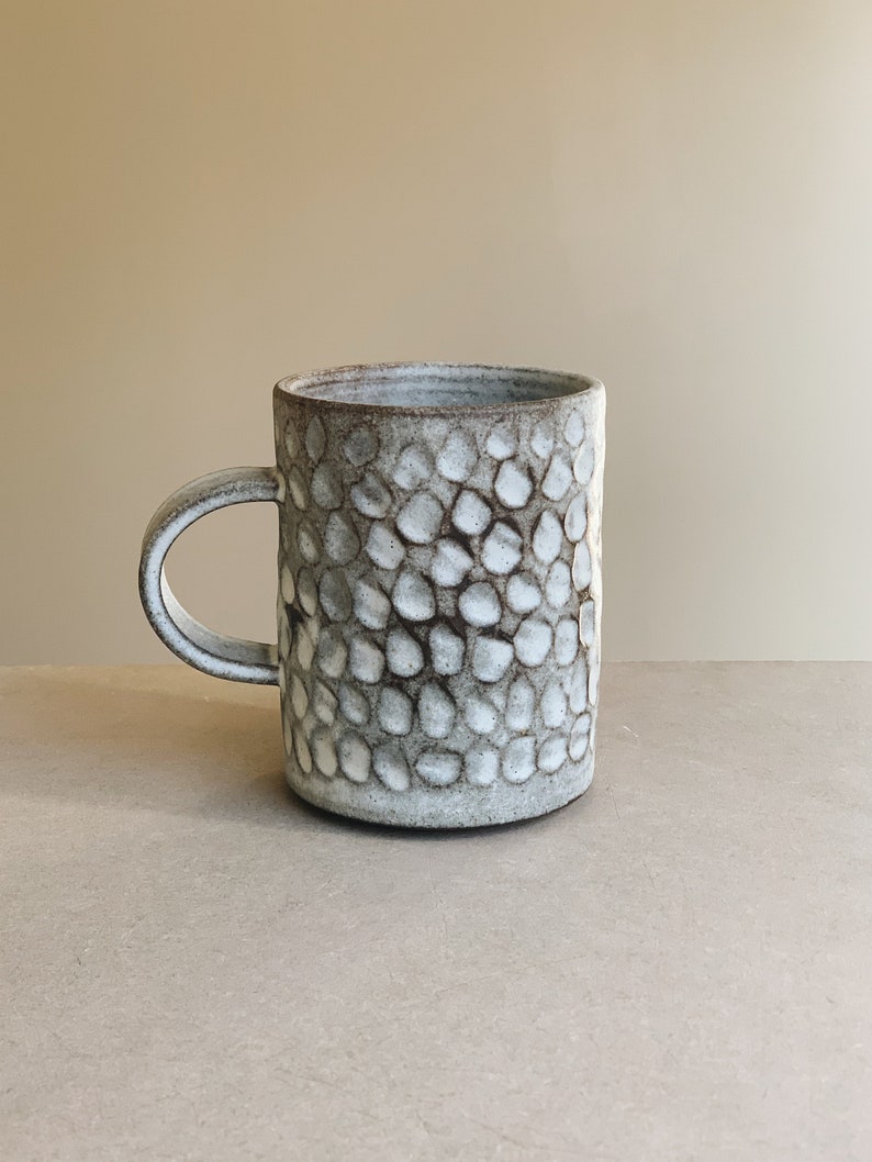 Hand carved rustic white ceramic mug cup in toasted clay, handmade stoneware ceramic Craters