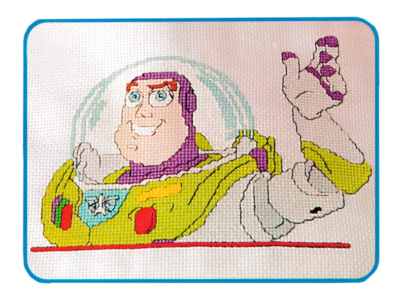 May include: Cross-stitch pattern of Buzz Lightyear from the Toy Story movie. The pattern features Buzz in his space ranger suit with a purple vest and a green and yellow spacesuit. He is smiling and has his arm raised in a wave.