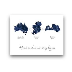 May include: A white print featuring watercolor maps of Australia, Ireland, and Latvia in navy blue. The text includes the cities Melbourne, Cork, and Riga, with the phrase "Home is where our story begins."
