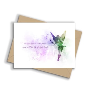 May include: A white greeting card featuring a watercolor illustration of a fairy in shades of green and purple. The text reads, All you need is Faith, Trust and a little bit of Pixie Dust. The card is placed on a brown envelope.