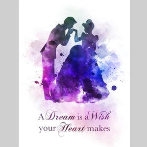 May include: A watercolour illustration of Cinderella and Prince Charming dancing. The background is a soft purple and blue watercolour wash. The quote "A Dream is a Wish your Heart makes" is written below the couple.