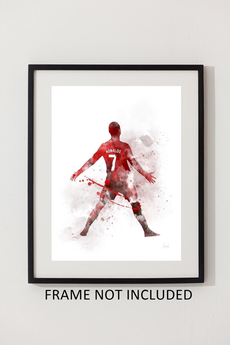 May include: A watercolor painting of a soccer player in a red jersey with the name "RONALDO" and the number "7" on the back. The player is in a dynamic pose with arms outstretched, against a white background with red watercolor splatters.