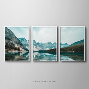 Set of three brown, blue and green mountain and lake reflection landscape prints. Set of 3 mountain range lake reflection modern wall art