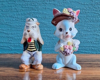 Pair of Kitsch Ornaments Rabbit with fruit and Dog with cap possibly Japan 1950/60s