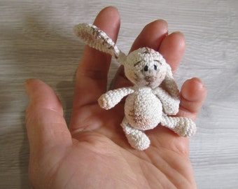 Tiny white rabbit will be a super cheer up gift. This bunny is unique and very small, it fits in your hand. Perfect Mothers Day gift.