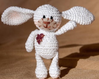 Rabbit toys. Tiny knit bunny is the best idea for small cute Christmas gift. Little cotton rabbit.