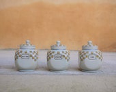 Series of 3 vintage ceramic pots