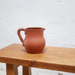 Vintage terracotta pitcher