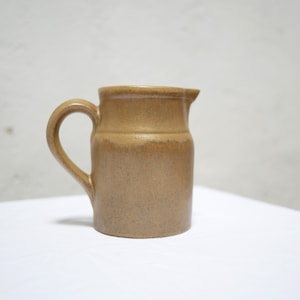 Vintage stoneware pitcher by the Digoin factory, France