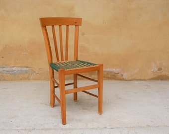 Country canned chair made of wood and rattan