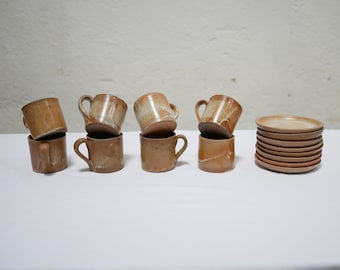 Series of 8 vintage sandstone cups and saucers