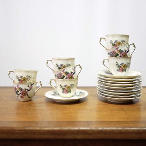 Set of 8 Limoges porcelain coffee cups and saucers by the Bernardaud factory