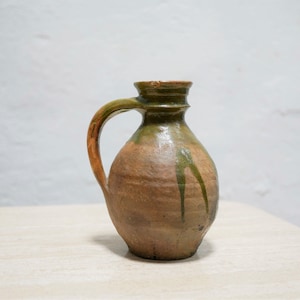 Old glazed terracotta jar