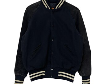 Chaqueta universitaria Skookum vintage de los 90 / Hecha en EE. UU. Cuerpo de lana, mangas de ante y cuero / Bomber universitaria azul marino y negra / Talla 38 M