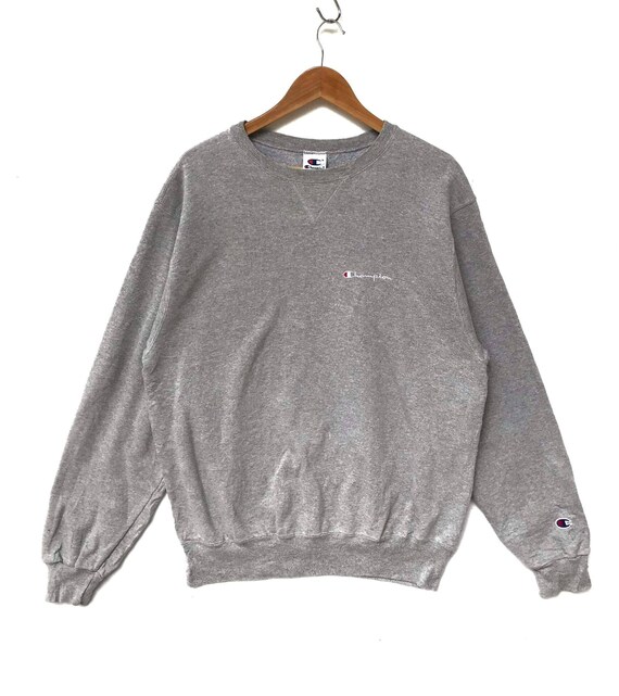 champion jumper small logo