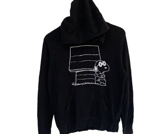 Sudadera vintage KAWS x UT Japan, estilo jersey, con logo grande, talla mediana.