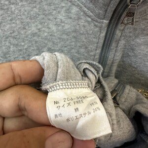 May include: A white tag with black text that reads "No. 2CJ-3080", "Size FREE", "Cotton 76%", "Polyester 24%".