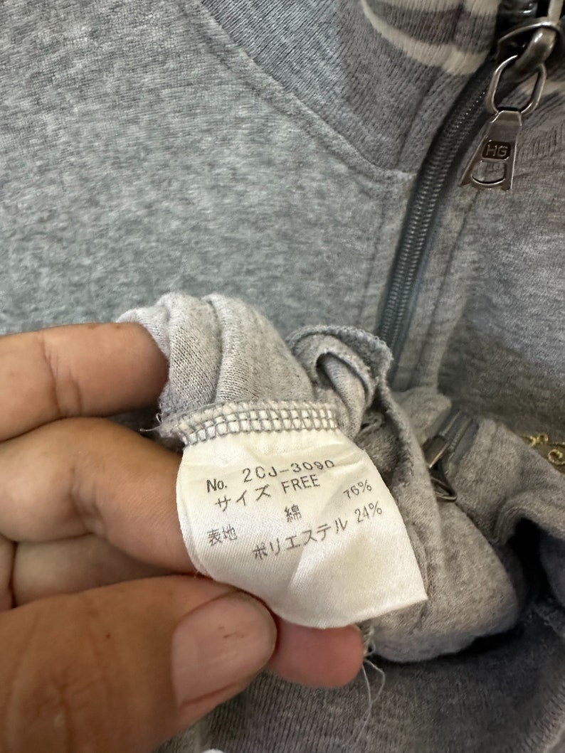 May include: A white tag with black text that reads "No. 2CJ-3080", "Size FREE", "Cotton 76%", "Polyester 24%".