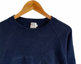Sudadera Fila vintage de los 90 con logo grande bordado. Diseño deportivo de moda de los 90, cuello redondo, talla grande.