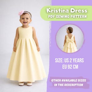 May include: A young child wearing a pale yellow dress with a pleated skirt and a large bow on the back. The dress is a size US 2 years, EU 92 cm. The image includes the text "Kristina Dress PDF Sewing Pattern".