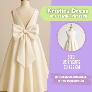 May include: Ivory-colored dress with a large bow on the back, displayed on a mannequin. The dress has a V-neck and a full skirt. Text on the image reads "Kristina Dress PDF Sewing Pattern" and "US 7 YEARS".
