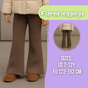 May include: Brown ribbed flared leggings with a high waist, shown in a front view and a circular inset back view. The text reads Flared leggings, SIZES: US 7-12Y, EU 122-152 CM. These leggings are paired with a cream puffer jacket and tan shoes.
