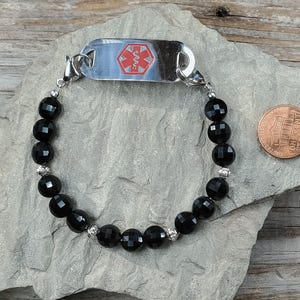 Litet medicinskt ID-armband i mikrofasetterad onyx, mycket hållbart stretchigt snöre
