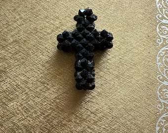 Black beaded cross pendant