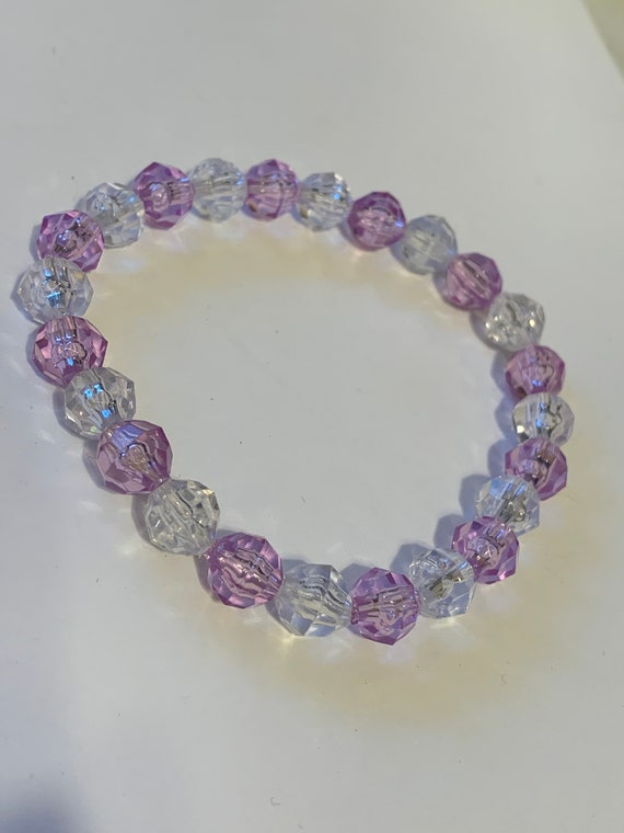 Stretchy clear and pink bracelet