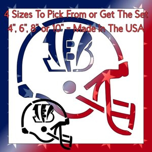 May include: A stencil featuring a football helmet design with the text 4 Sizes To Pick From or Get The Set 4, 6, 8 or 10 - Made In The USA. The large helmet outline is filled with a red, white, and blue star pattern, while a smaller black version sits below.