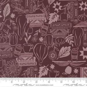 May include: A dark maroon fabric featuring a repeating pattern of light pink line drawings including stacks of books, pumpkins, sunflowers, leaves, and coffee cups. A white ruler at the bottom shows a scale of 18 cm for the fabric design.