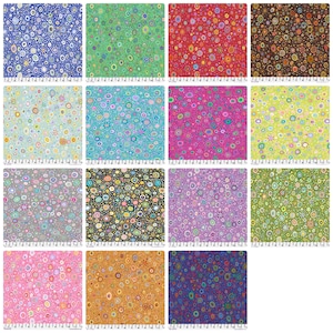 May include: A collection of fifteen fabric swatches featuring a repeating pattern of multi-colored circles and dots in various hues including blue, green, red, brown, pink, yellow, and purple, each with a visible ruler along the bottom edge.