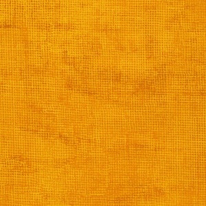 May include: Close-up of a textured fabric in a warm, golden-yellow hue. The fabric has a grid-like pattern, creating a woven appearance. The color is consistent throughout, with subtle variations in tone.