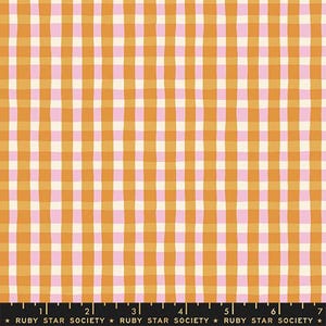 May include: A fabric featuring a gingham pattern in shades of orange, pink, and white. The design consists of intersecting vertical and horizontal lines forming a grid of checks. The fabric has a slightly irregular, hand-drawn quality. The text "RUBY STAR SOCIETY" is at the bottom.