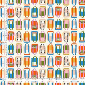 May include: A fabric print featuring a repeating pattern of colorful tote bags in shades of orange, blue, green, and pink, arranged on a cream background, with a visible ruler showing measurements in inches along the left and bottom edges.