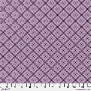 May include: A fabric with a repeating pattern of intersecting ovals and four-petal flower shapes in shades of purple and black. The design is set against a light purple background. The image includes a ruler with inch measurements.