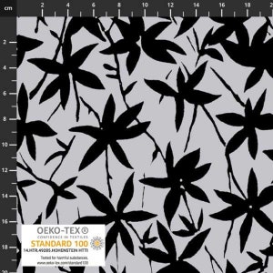 May include: A fabric with a repeating pattern of black stylized leaves and stems on a light gray background. The image includes the Oeko-Tex Standard 100 label, indicating the fabric is tested for harmful substances.