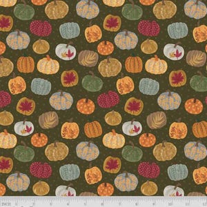 May include: Fabric with a repeating pattern of pumpkins and fall leaves in shades of orange, yellow, green, and blue on a dark green background. The pumpkins vary in style and size, with some featuring knitted textures. The fabric has a dotted pattern.
