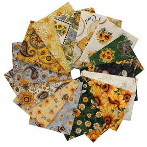 May include: A collection of fabric squares with various sunflower and paisley patterns. The color palette includes yellow, gold, green, and gray. Some squares feature bees, daisies, and bicycle illustrations. Ideal for quilting and crafting projects.