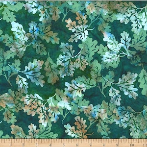 May include: Textile featuring a repeating pattern of oak leaves in shades of green, white, and tan. The leaves are detailed and spread across a dark green backdrop. The fabric is likely cotton or a similar material, suitable for various craft projects.